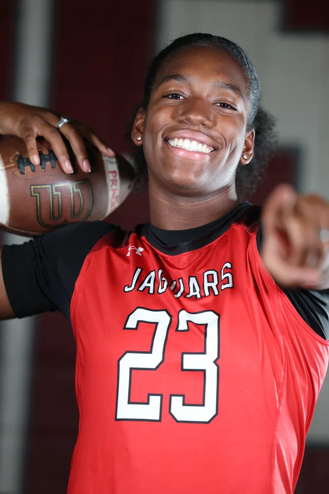 Holding the ball, smiling on Media Day 2026