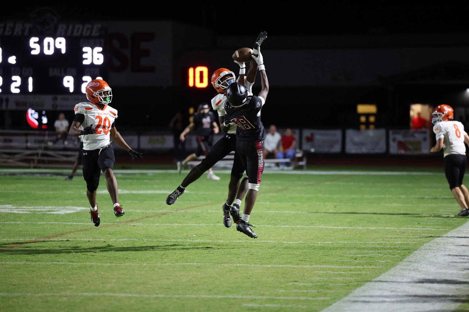 DRHS Football WR going up for the ball