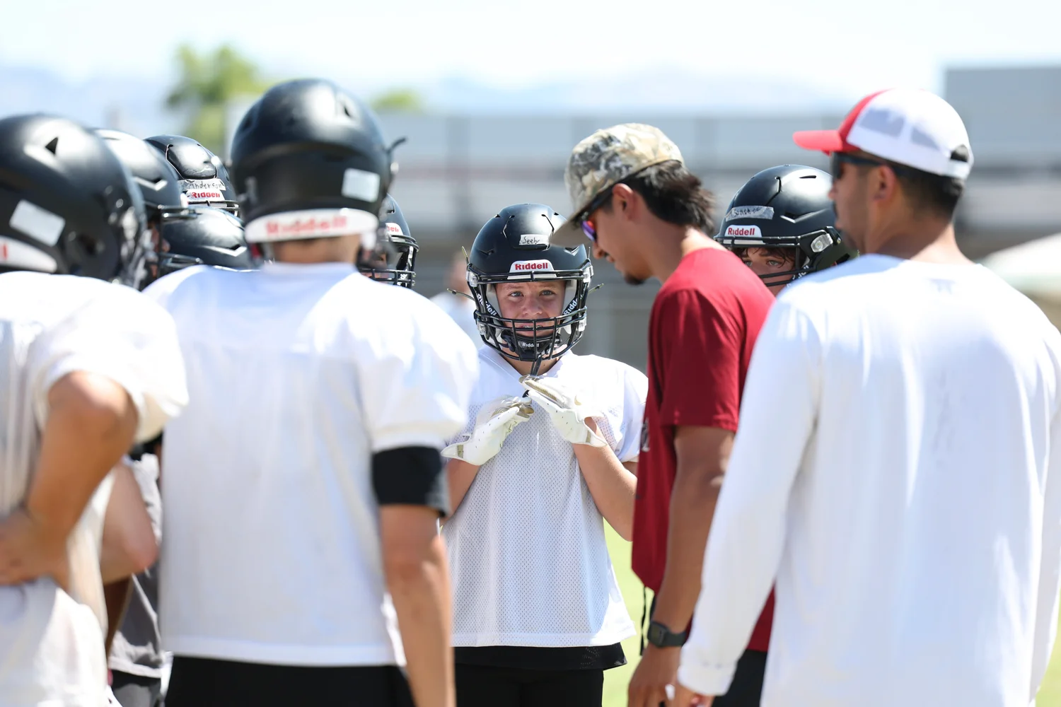 DRHS player listening to coach