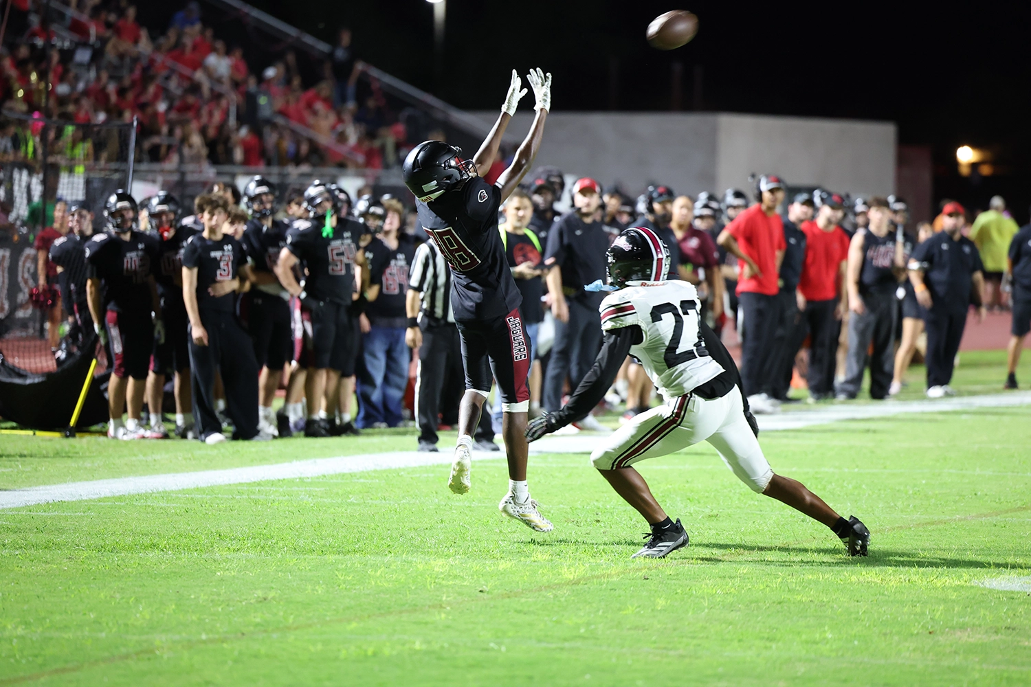 WR going up for the catch