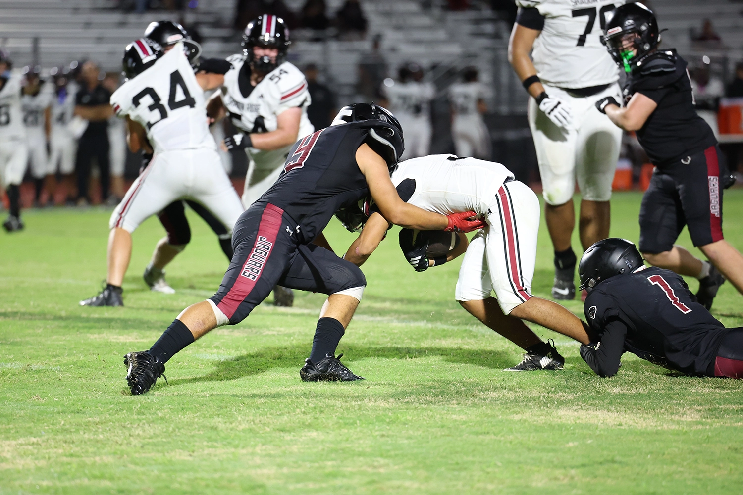 DB making a tackle against Shadow Ridge
