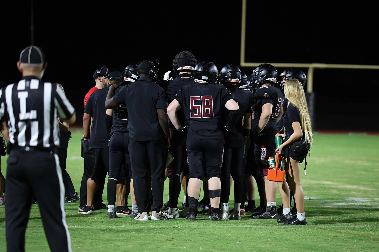 Desert Ridge Football in the Huddle during a TO