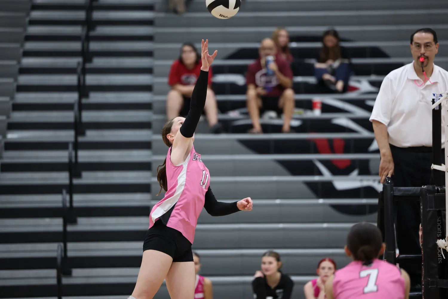 Girls Volleyball hitting the ball back to Marana