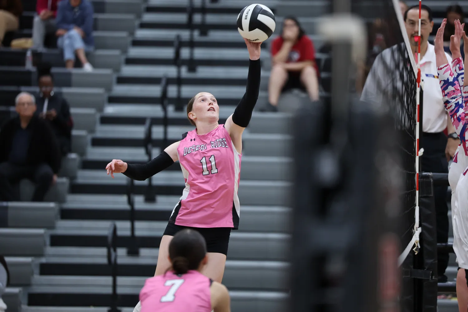 Girls Volleyball Reaching for the ball